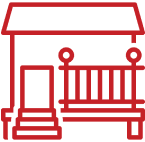 Red outline of a house with porch.